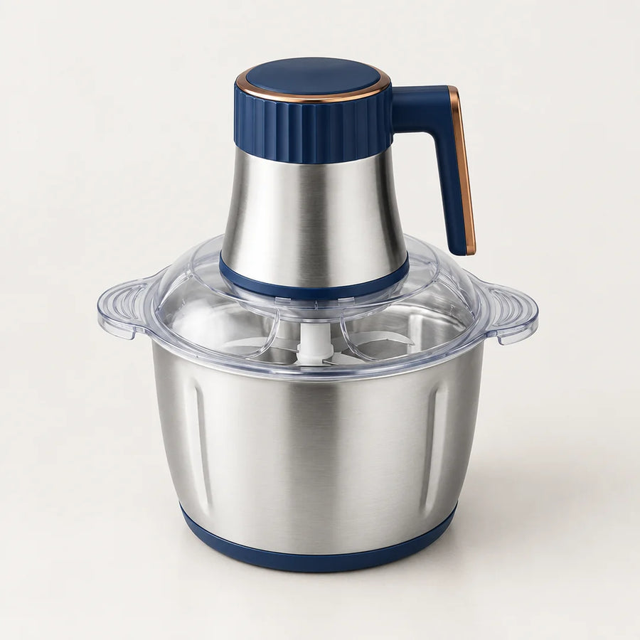 Hachoir électrique inox 5L 500W à dessus bleu marine et poignée cuivrée, grand bol inox, vu en plongée sur fond blanc cassé