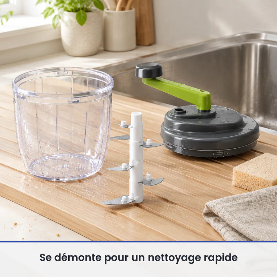 Bol, axe à 5 lames et couvercle à manivelle verte du hachoir 900 ml lavés à la main sur un égouttoir près de l'évier