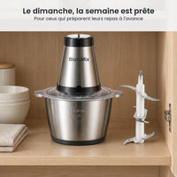 Hachoir électrique BioloMix 500W rangé dans un placard de cuisine, sa lame de rechange posée juste à côté