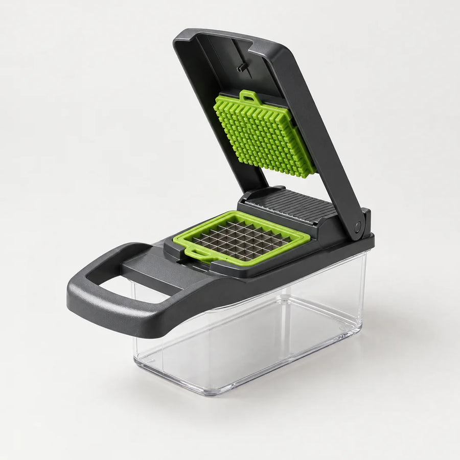 Coupe-légumes 12 en 1 à cadre gris anthracite, couvercle articulé ouvert, poussoir et grille verts, bac transparent
