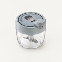 Hachoir manuel rotatif 200 ml à couvercle gris bleuté, petite manivelle grise et bol transparent, sur fond clair